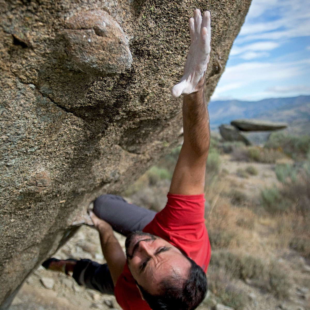 Chalk on hand while rock climbing