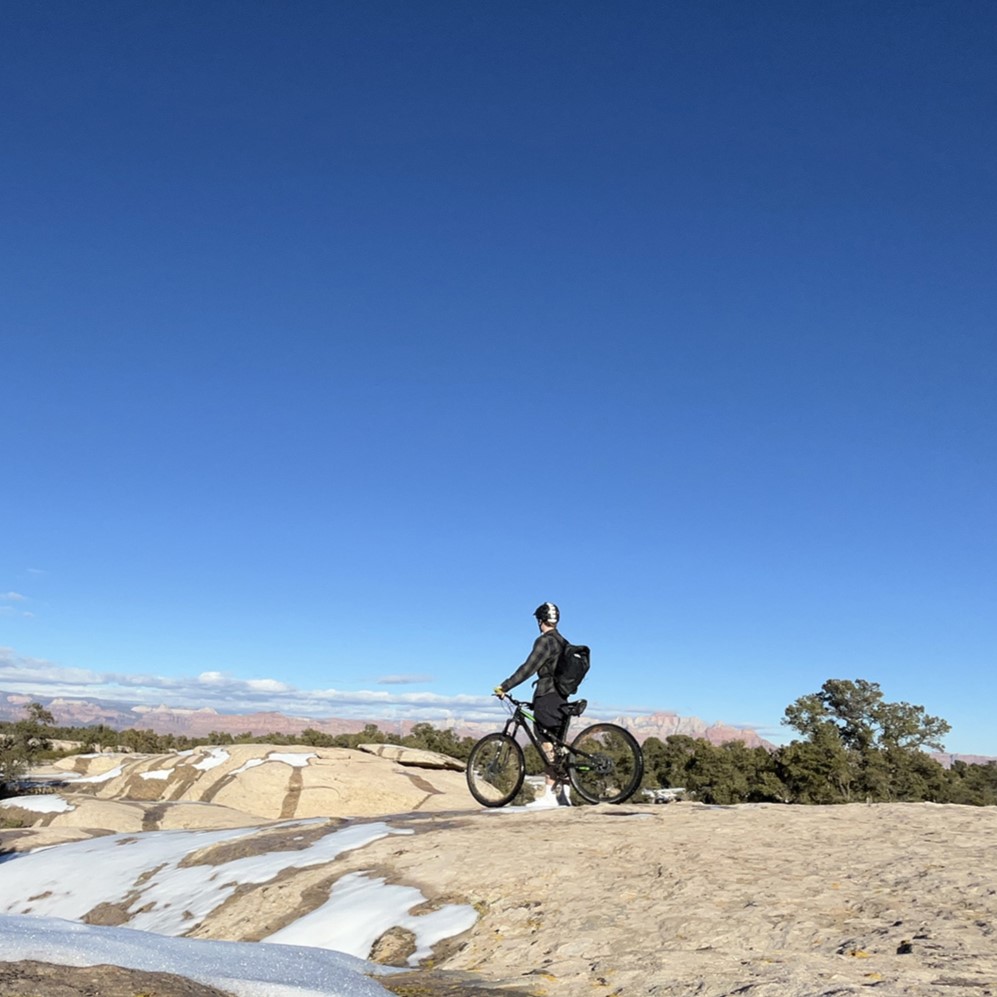 riding gooseberry mesa in southern utah with bell mountain bike helmet