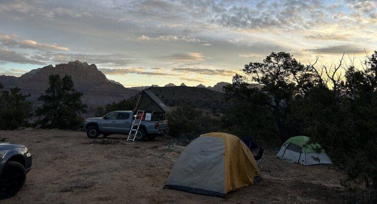 Cropped photo of the Wire Mesa trailhead campsite at dusk