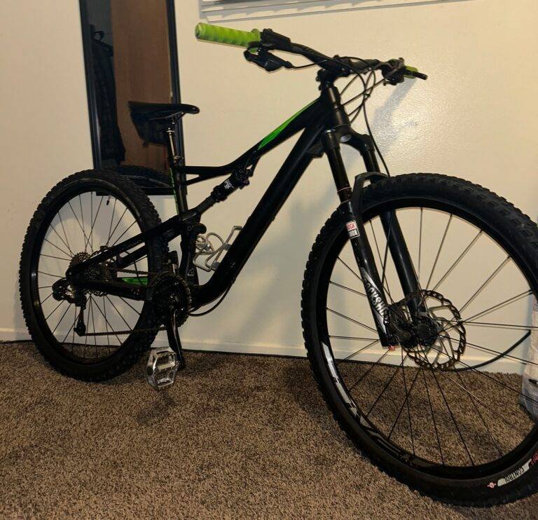 Specialized Camber full-suspension mountain bike photographed indoors